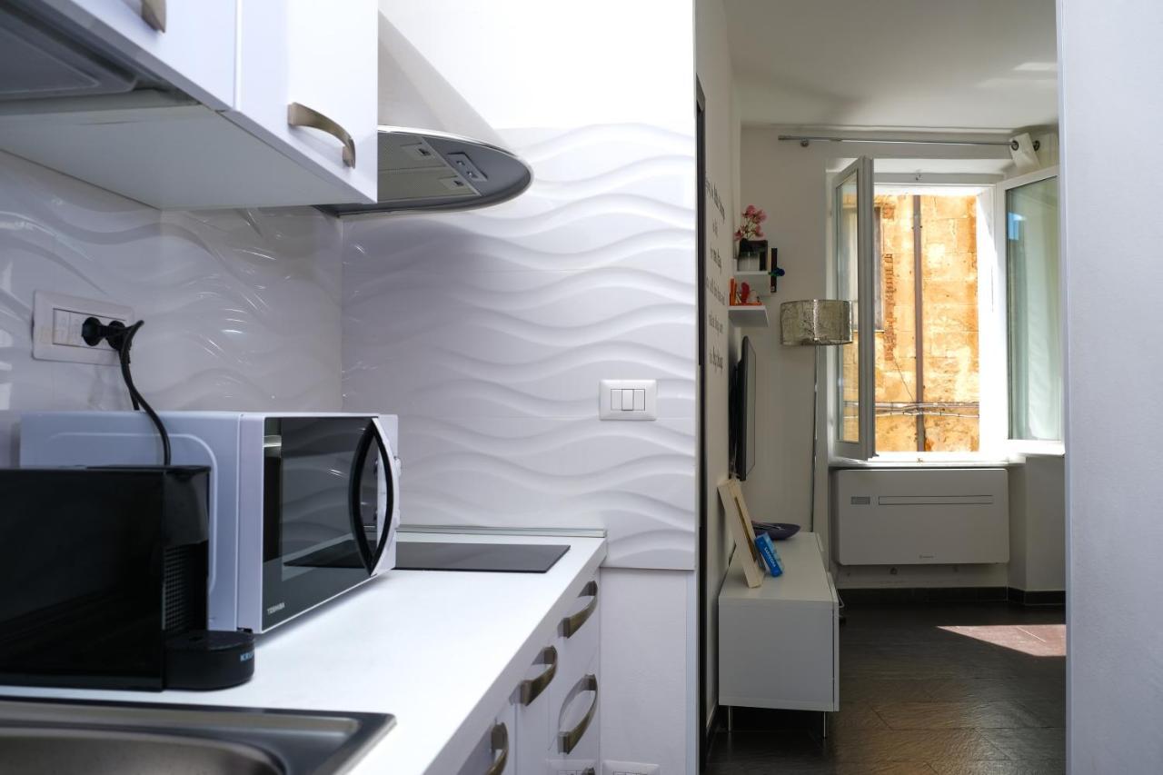 Welcomely - Joia Apartment Alghero Bagian luar foto