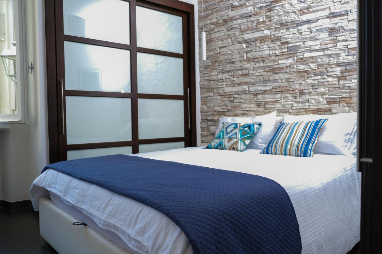 Welcomely - Joia Apartment Alghero Bagian luar foto